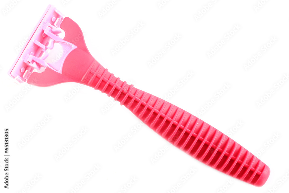 Safety pink plastic razor isolated on white. Safety pink plastic razor isolated on white.