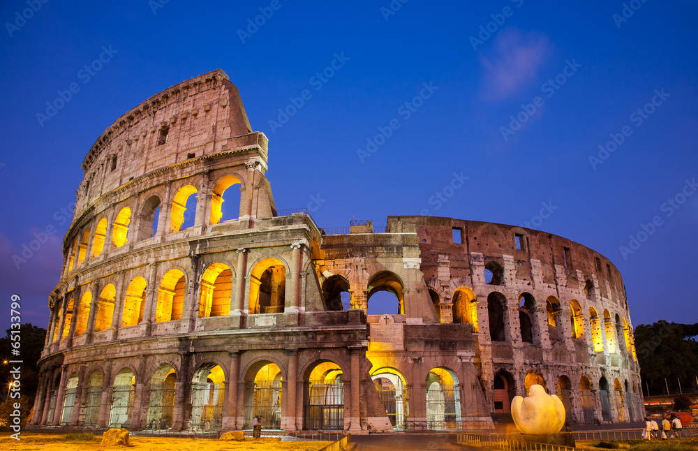 The Coliseum at night in Rome, Italy