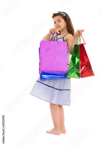 little girl with packages