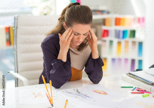 Schilderij op canvas Portrait of stressed fashion designer in office