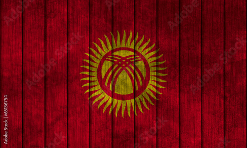 Illustration with flag in map on grunge background - Kyrgyzstan