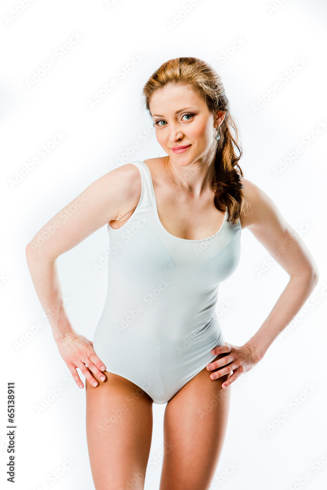 young and beautiful woman in white swimsuit young and beautiful woman in white swimsuit