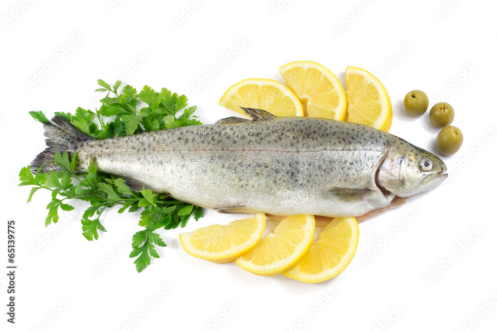 Fresh trout with parsley, lemon and olives isolated on white Fresh trout with parsley, lemon and olives isolated on white