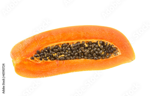 Half of fresh papaya fruit with seed isolated on white
