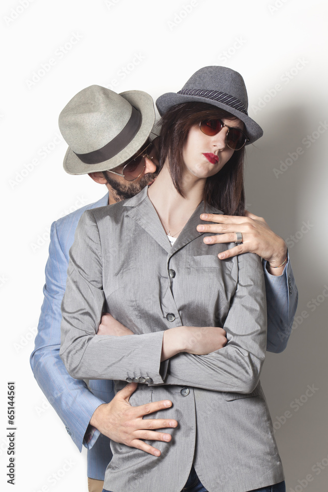 Gangster couple with upset woman
