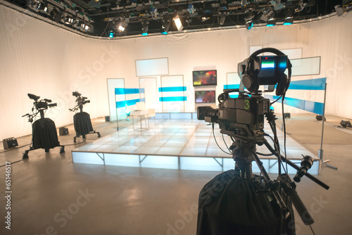 Television studio with camera and lights