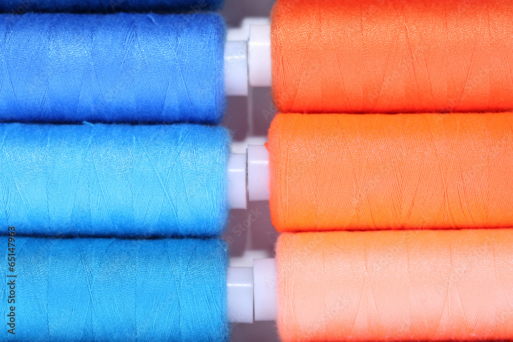 Multicolor sewing threads background Multicolor sewing threads background
