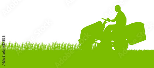 Man with lawn mower tractor cutting grass in field landscape abs photo