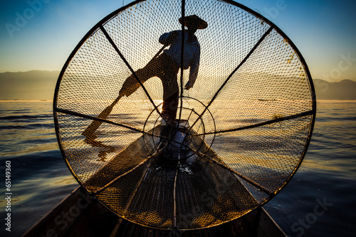 Silhouette fishermen in Inle Lake at sunrise  Shan State  Myanma
