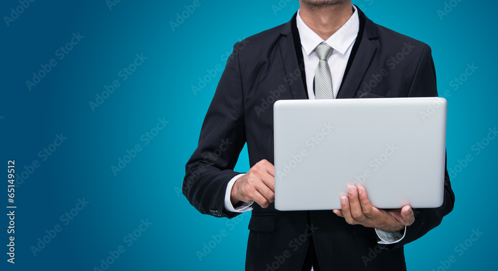 Businessman standing posture hand hold notebook laptop isolated Businessman standing posture hand hold notebook laptop isolated
