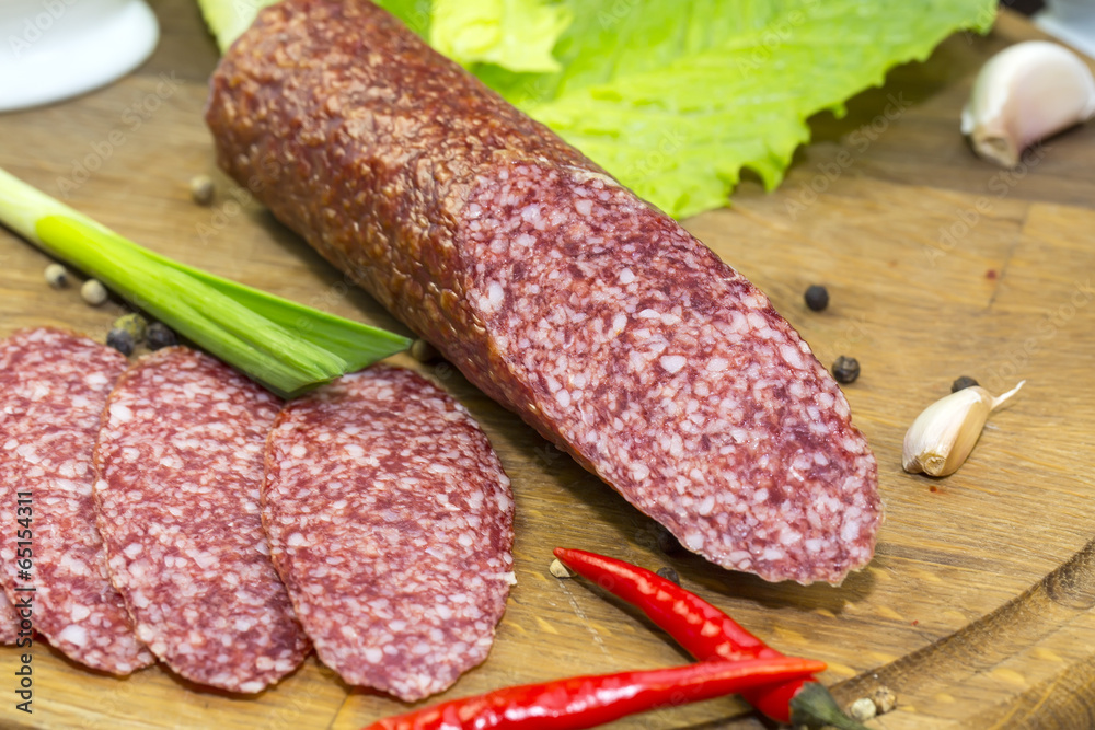 sausage on a wooden plate in a restaurant