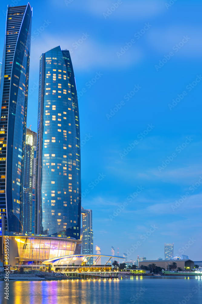 Fototapeta premium Skyscrapers of Abu Dhabi at dusk, United Arab Emirates