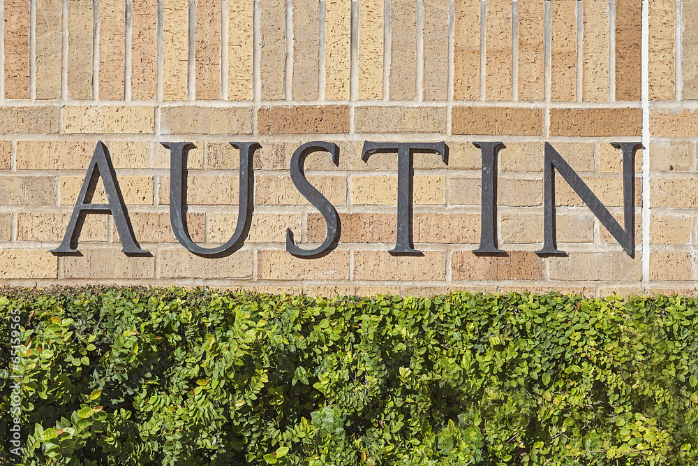 Austin Text Sign Mounted on a Brick Wall