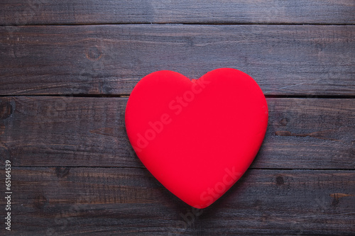Heart shape on wooden table.