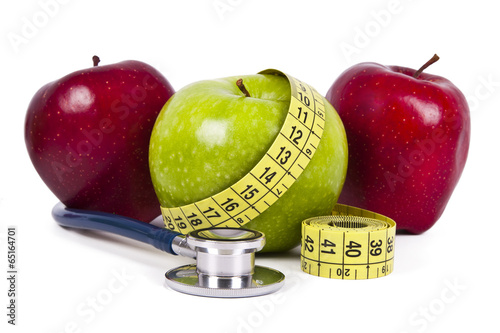fresh fruit with measuring cintra concept of healthy diet photo
