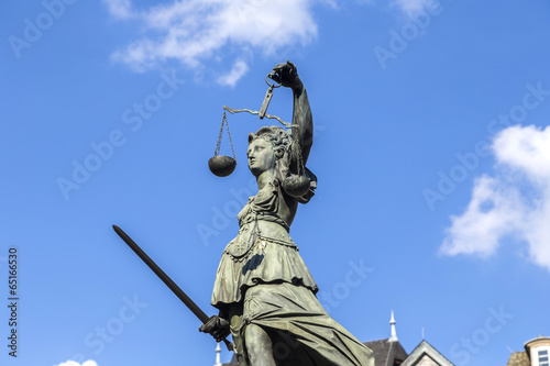 Justitia (Lady Justice) sculpture on the Roemerberg square in Fr