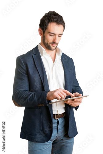 Casual Businessman Looking at a Tablet