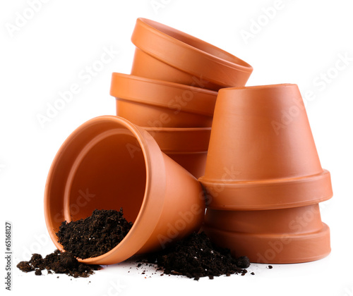 Vászonkép Clay flower pots and soil, isolated on white