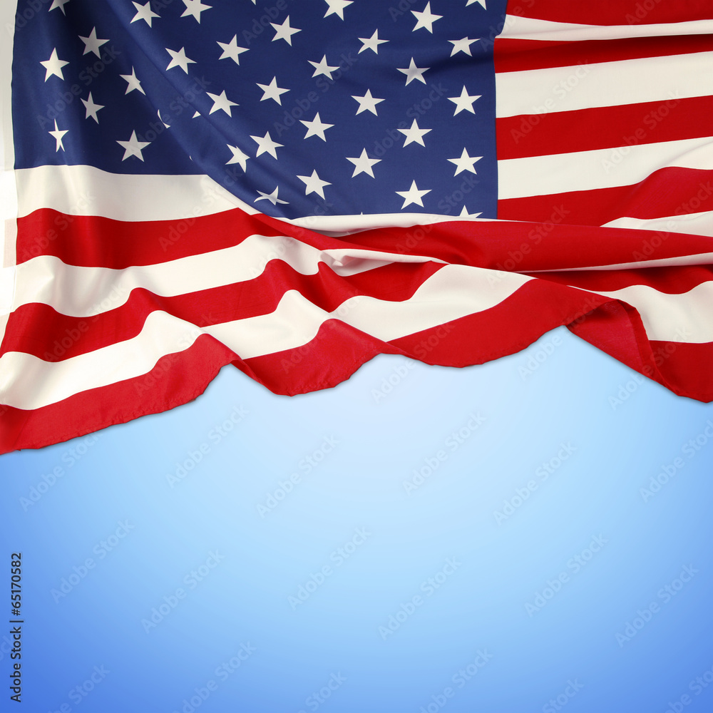 Obraz premium American flag on blue background. Copy space