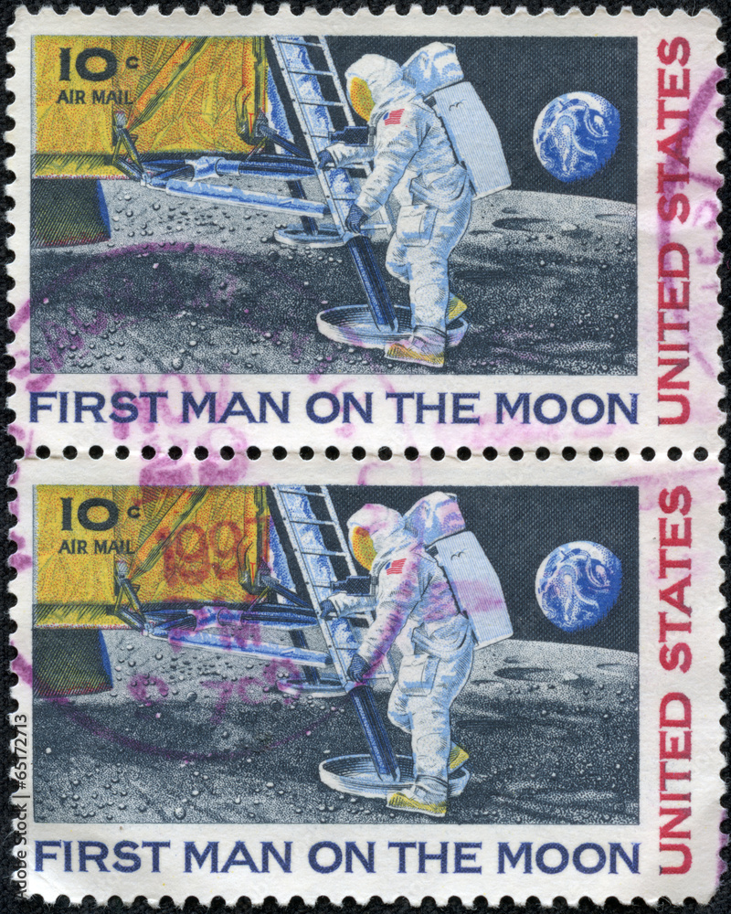 stamp shows Neil Armstrong, first step on the moon