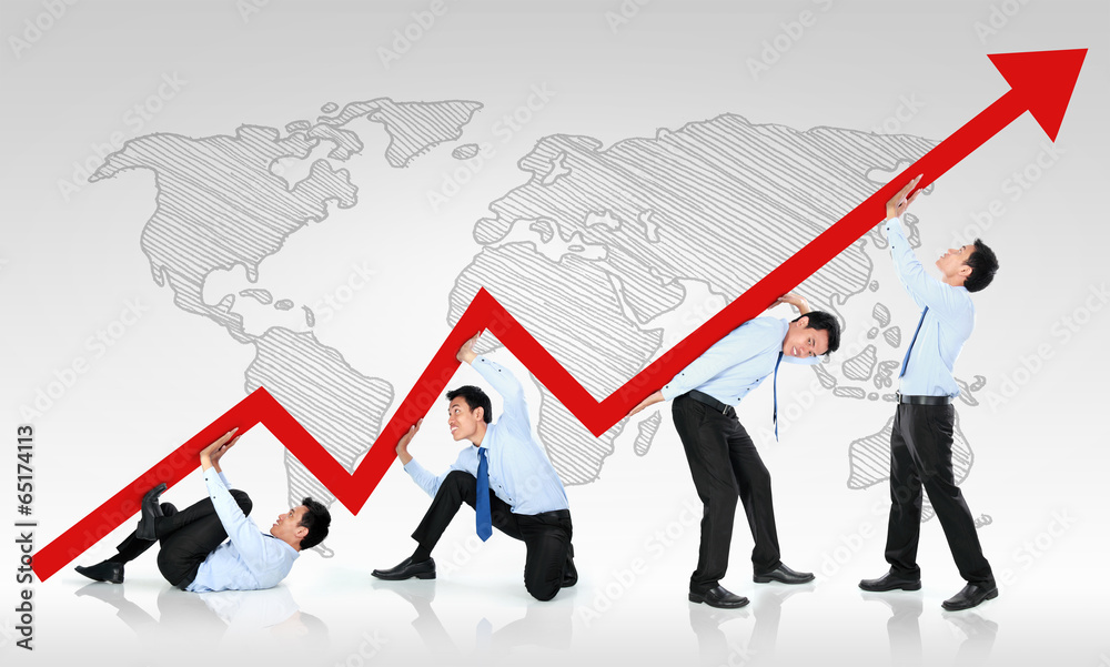 Fototapeta premium business man pushing a business graph upwards