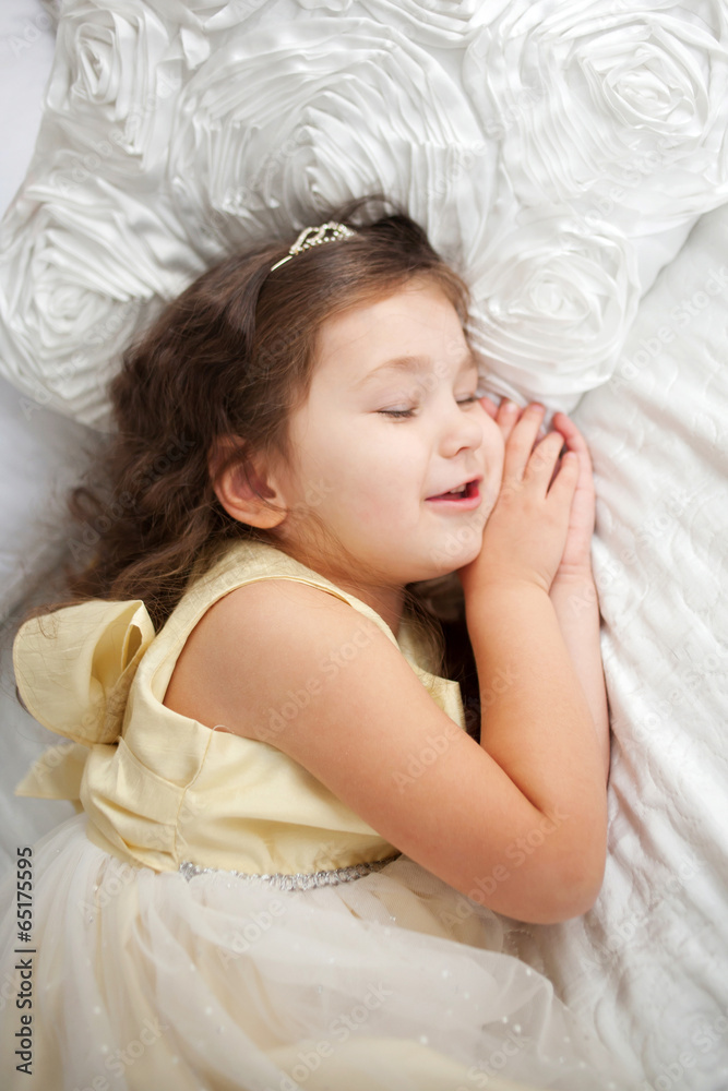 Sweet dreams. Happy smiling kid sleeping