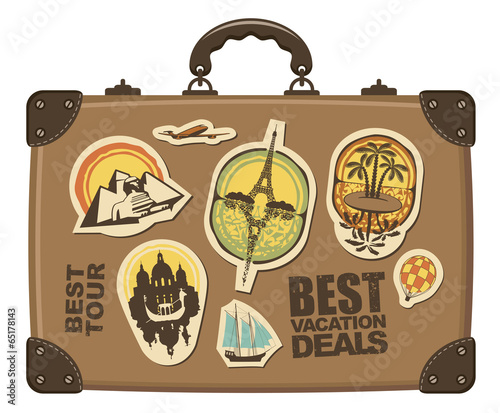 Travel suitcase with stickers of different cities