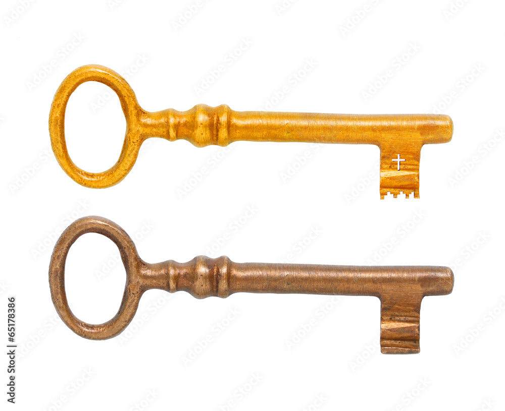 Golden and bronze keys isolated on white background. Golden and bronze keys isolated on white background.