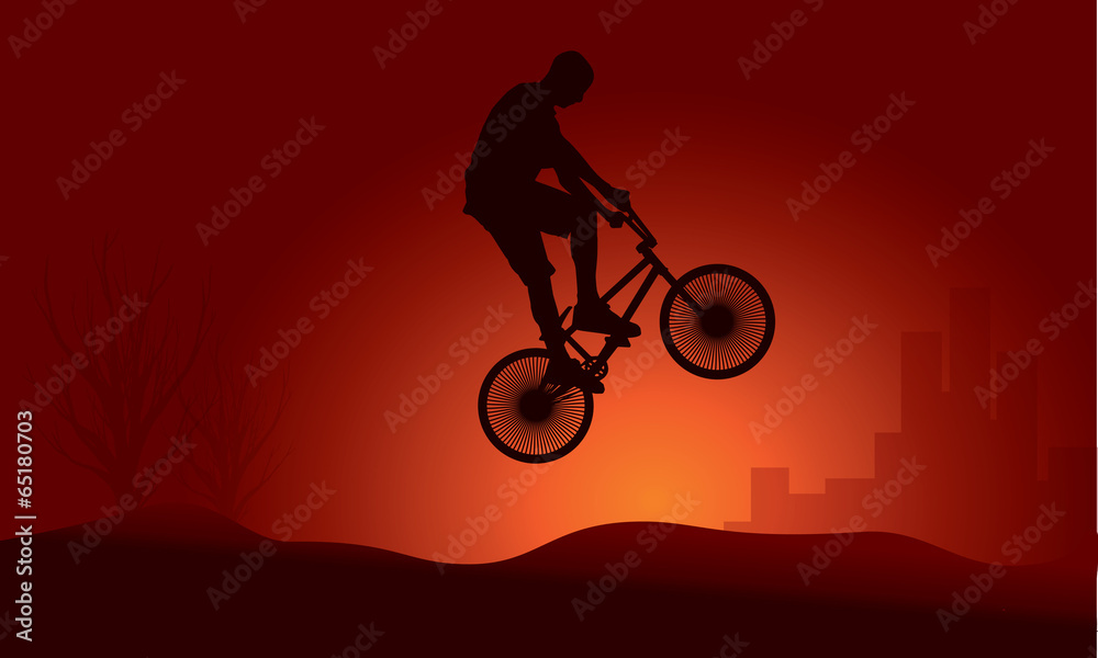 Obraz premium Bmx rider jump silhouette