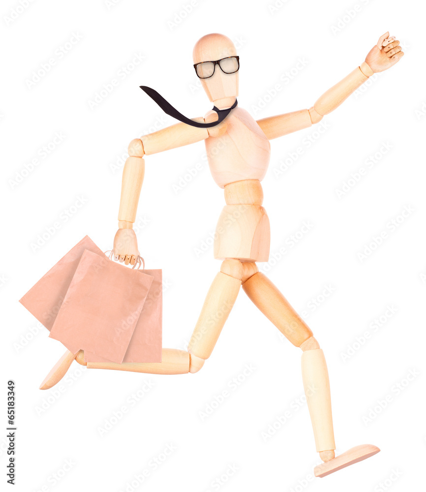 happy wooden Dummy with shopping bags happy wooden Dummy with shopping bags