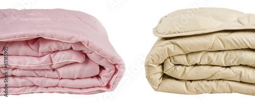 Parts of pink and beige blankets isolated on white background
