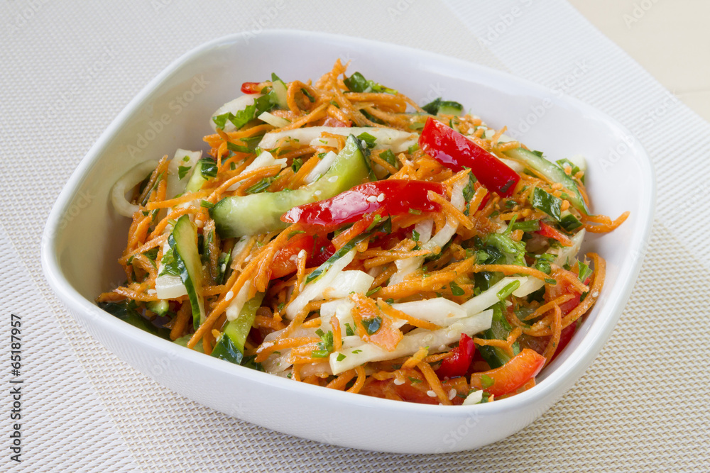 Asian style salad with fresh vegetables and spicy dressing