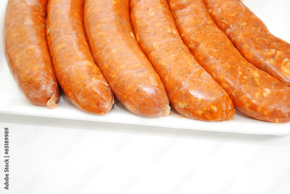 Spicy Sausage with Copy Space Isolated on White Spicy Sausage with Copy Space Isolated on White