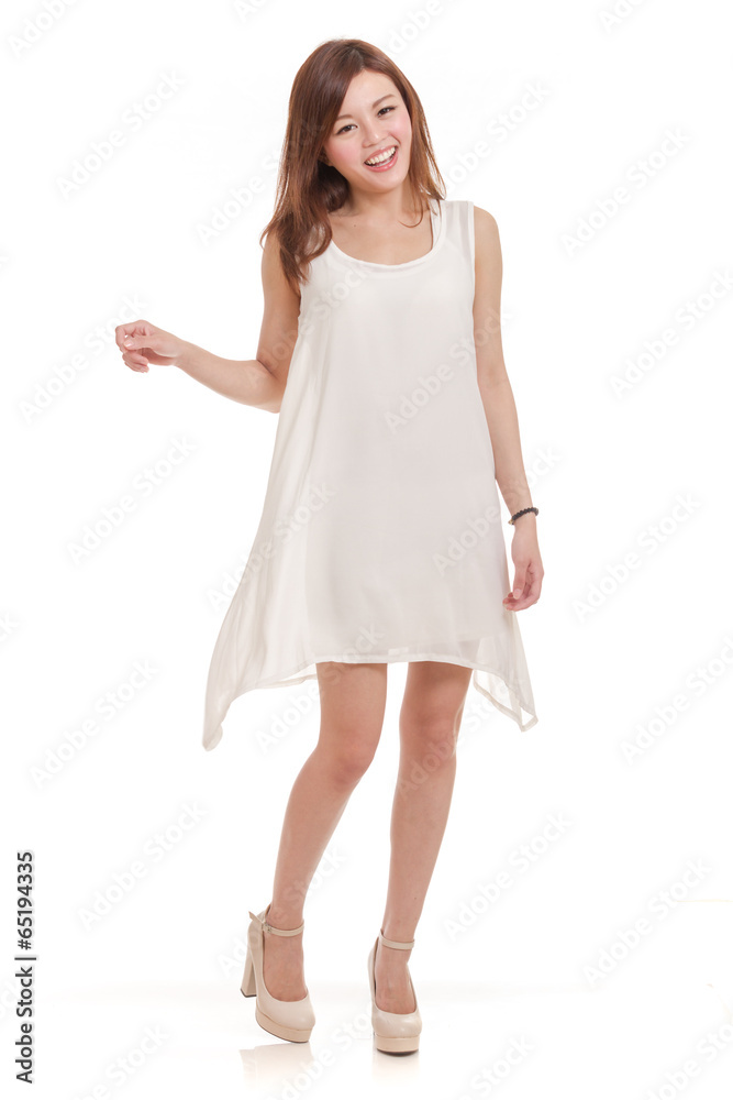 Malaysian woman in white dress surprised