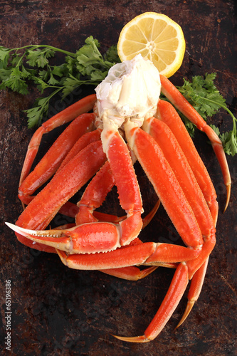 Crab legs on brown background