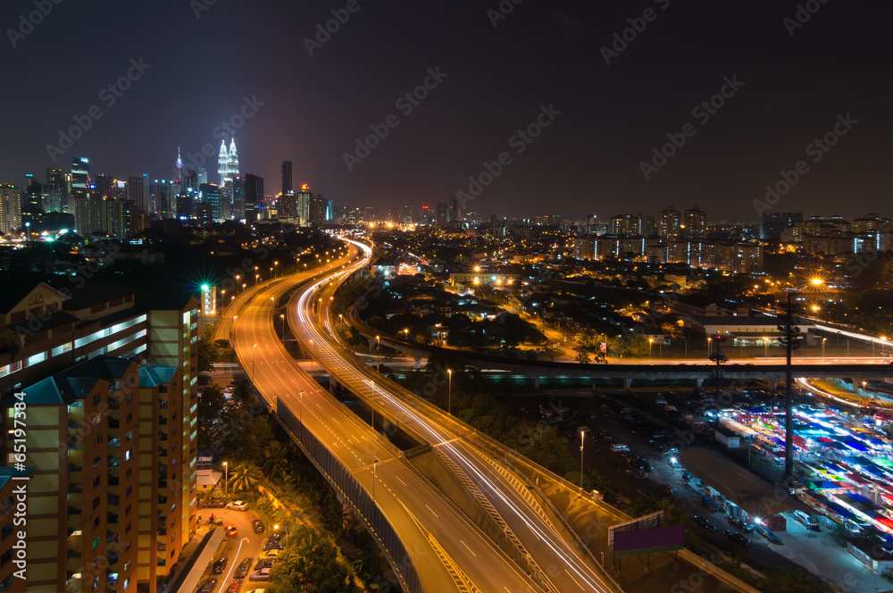 Night view of elevated busy highway heading towards Kuala Lumpur Night view of elevated busy highway heading towards Kuala Lumpur