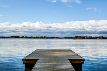 Fotobehang Pier Pier onder lage wolkenhemel  © Alexander_photo