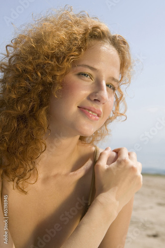 Junge Frau am Strand,Lächeln,portrait