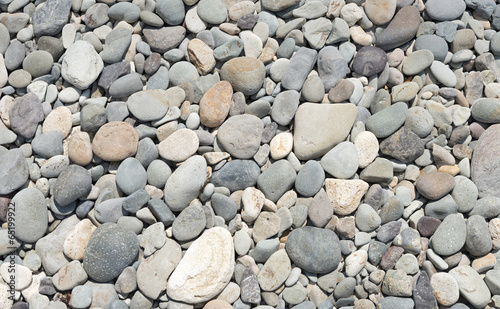 Close-up view of different pebble as background.