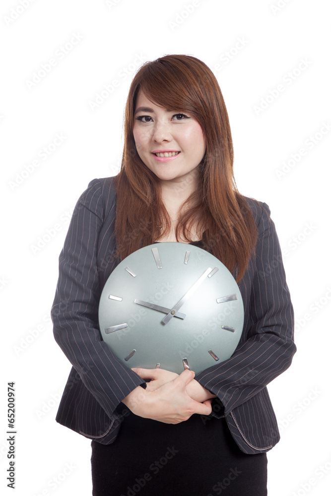 Asian Businesswoman hold a clock Asian Businesswoman hold a clock