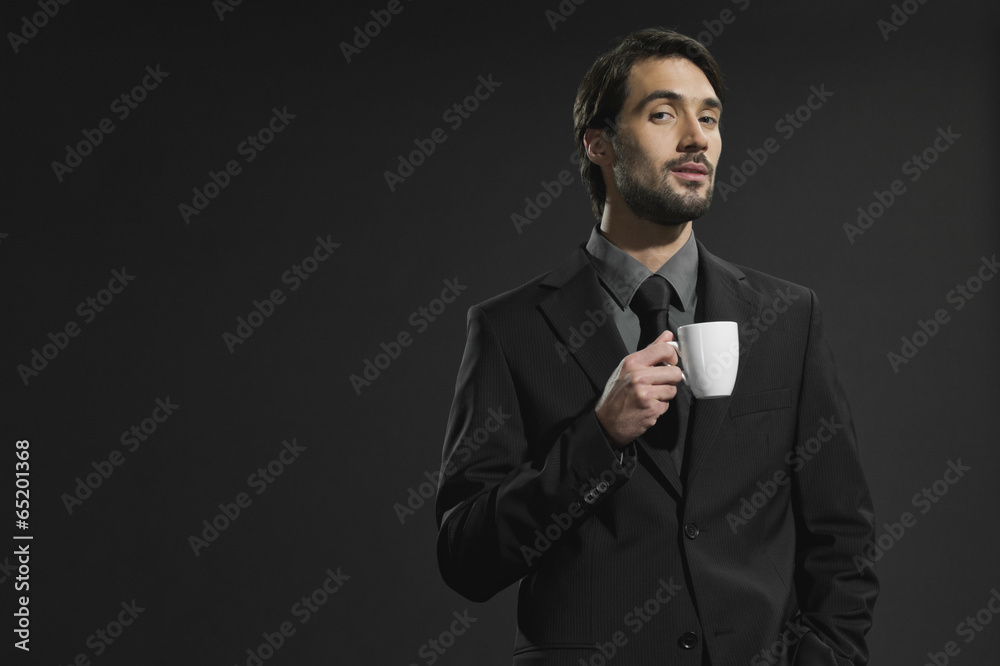 Junger Mann mit Kaffeetasse,Portrait Junger Mann mit Kaffeetasse,Portrait