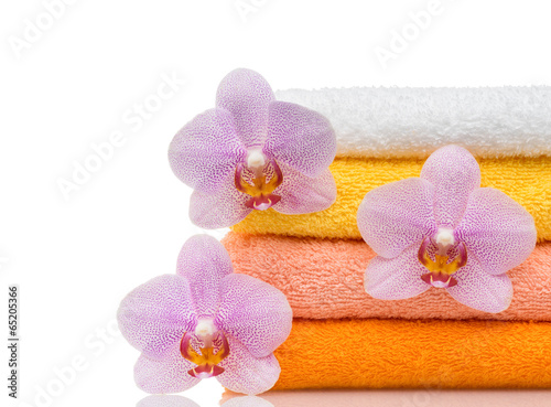 colorful towels and flower isolated on white