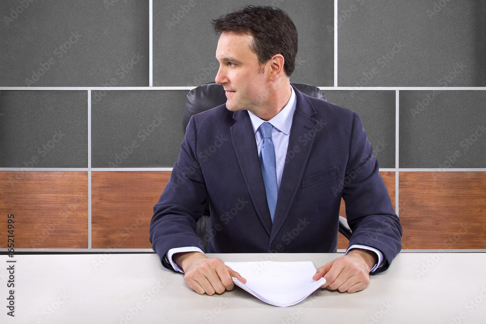 male news anchor or reporter in a studio set Stock Photo Adobe Stock