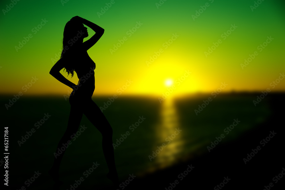 Sunset, sexy woman silhouette