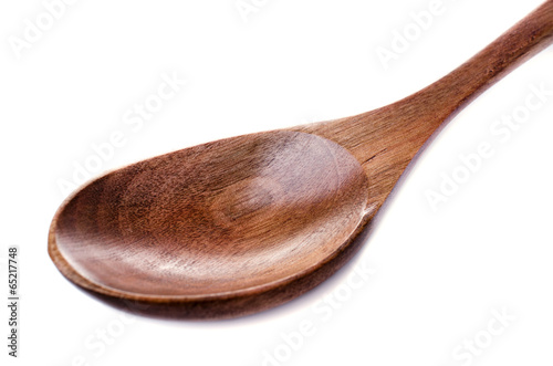 Wooden spoon on White background photo