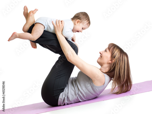 mother with baby doing gymnastics and fitness exercises