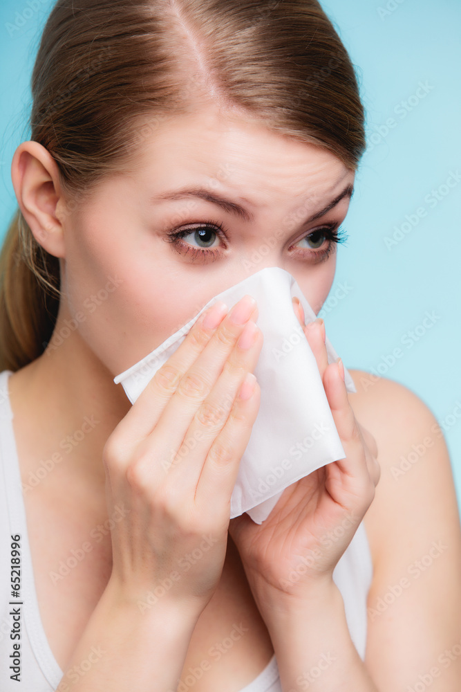 Flu allergy. Sick girl sneezing in tissue. Health Flu allergy. Sick girl sneezing in tissue. Health
