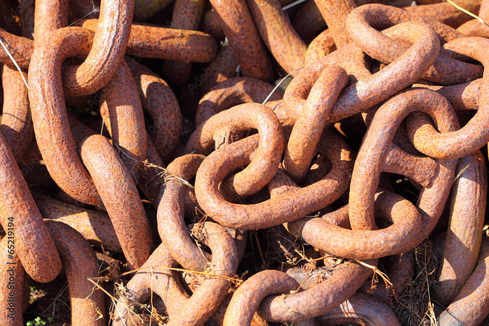Closeup of large rusty chain links Closeup of large rusty chain links