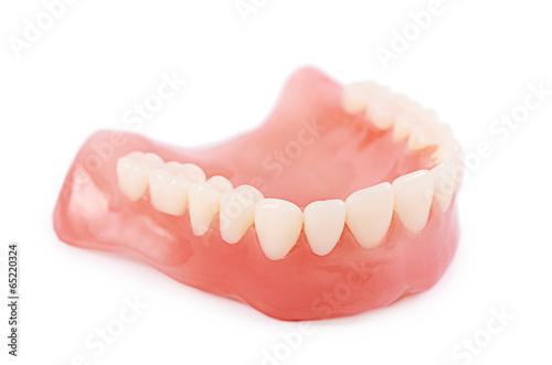 Set of false teeth isolated on white background