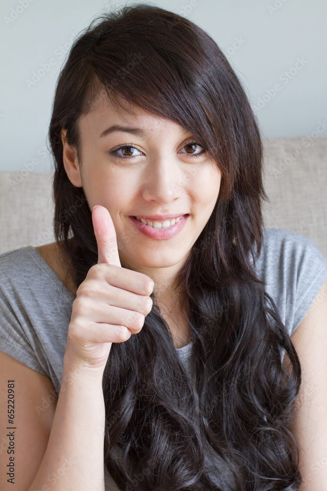 woman giving thumb up, asian caucasian mixed race woman giving thumb up, asian caucasian mixed race